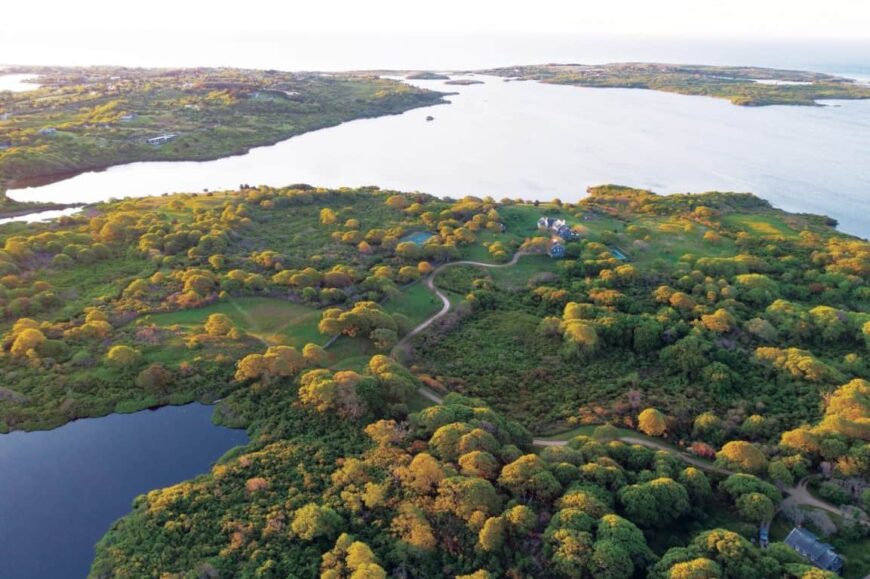 Here's the entire aerial view of the property, showcasing the large farm and the lovely nature surrounding it. Images courtesy of Toptenrealestatedeals.com.