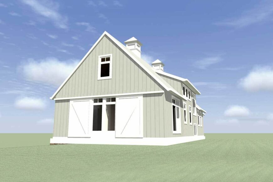 Home's front view with gable roofs, gray exterior siding, and white shutters.