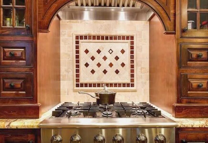 Decorative tile backsplash accentuates the cooking alcove.