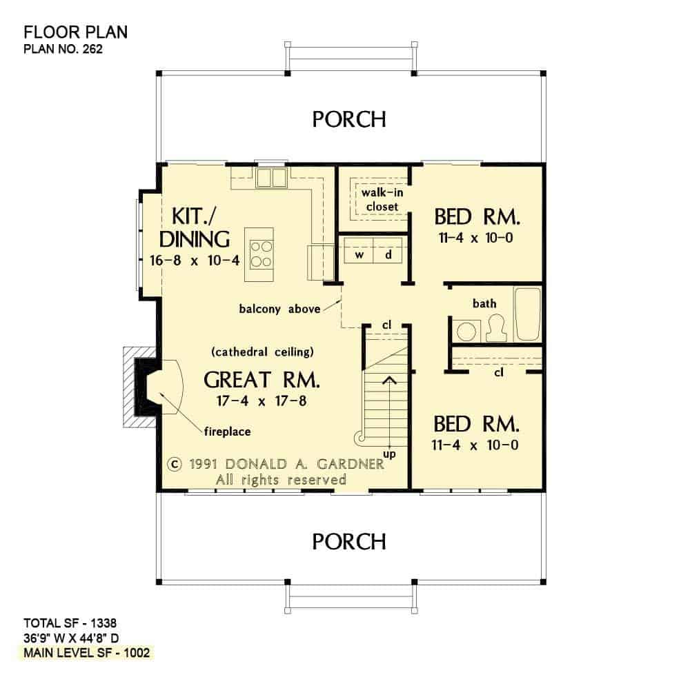 Main level floor plan of a two-story 3-bedroom The Shady Grove cabin home with great room, shared kitchen and dining area, two bedrooms, and front and rear porches.