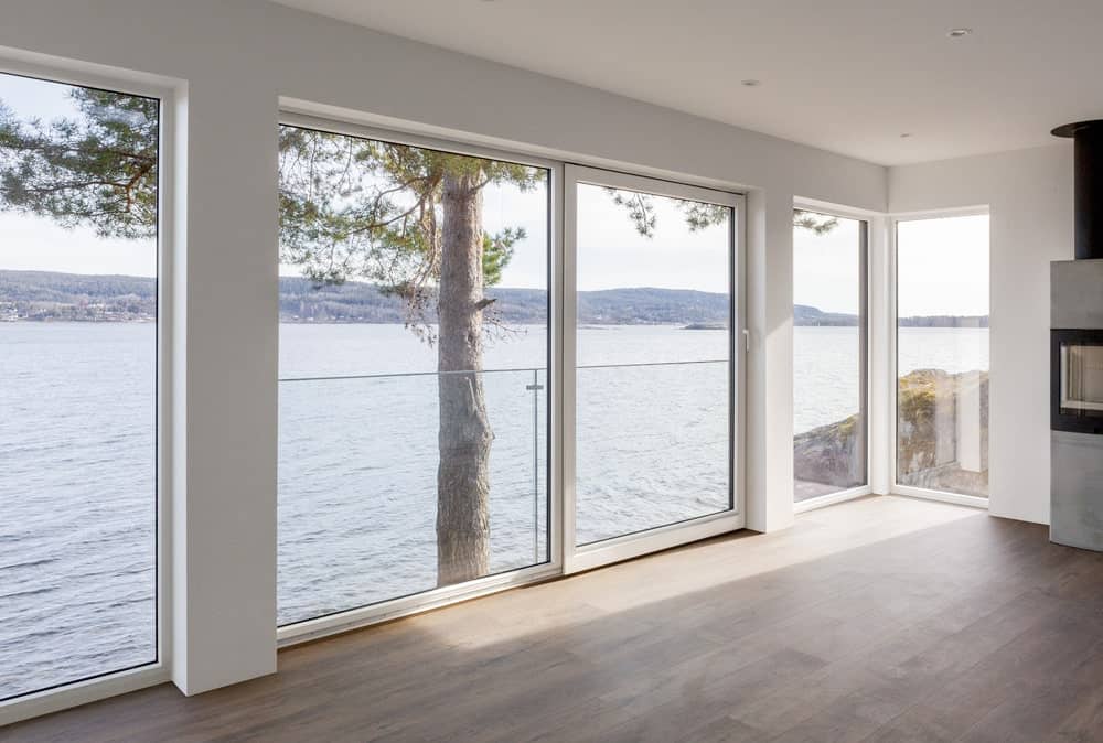 This is a look at the interior of the jouse with large glass wall that maximize the view of the water scenery outside.