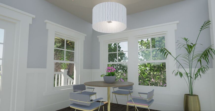 Dining area with gray contemporary chairs and a round dining table well-lit by a drum chandelier.