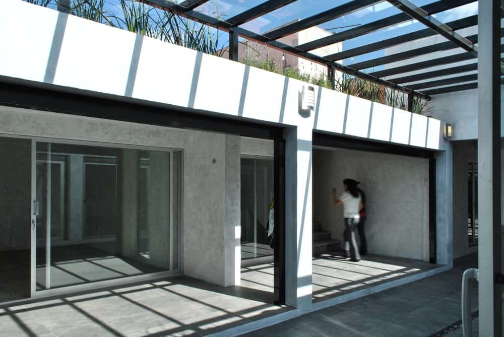 This is another view of the courtyard and the covered patio area on the side of the glass sliding doors.