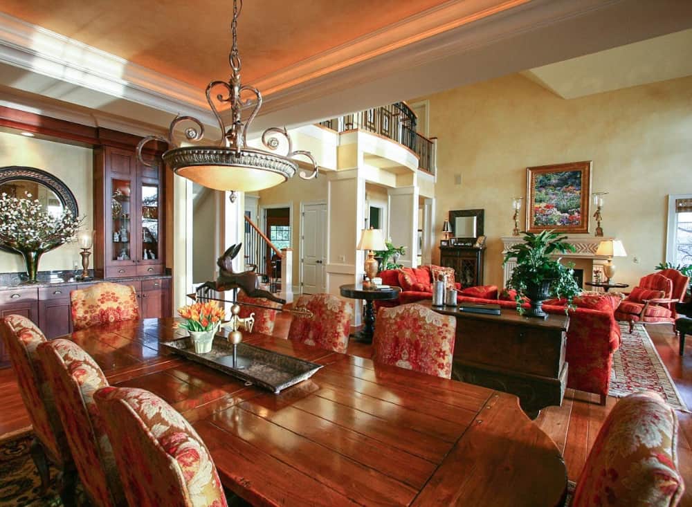 Behind the great room is the dining area crowned with a tray ceiling.