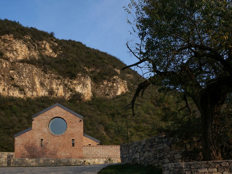 Yanqing residential house exterior hillside view.