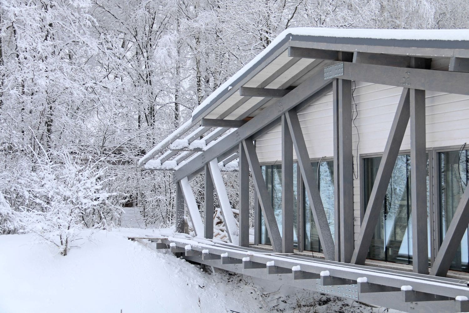 Bridge house side view from outside with snow