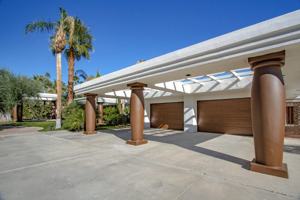 The garage is spacious and includes a skylit porch. Image courtesy of Toptenrealestatedeals.com