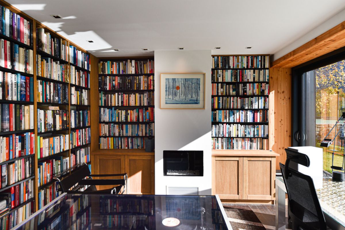 The private office in the ground floor with shelves in every corner contains variety of books.