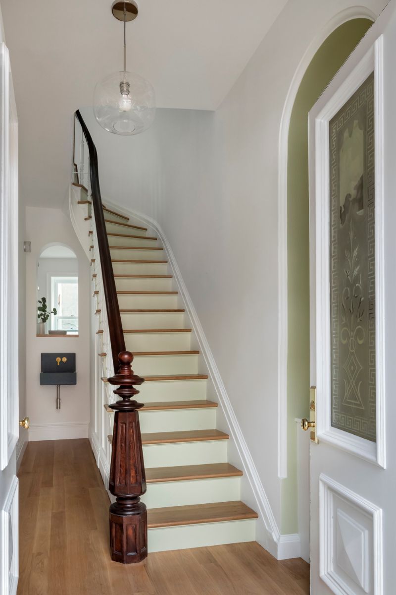 Farrow and Ball Green Ground is used to paint the risers of the stairs.