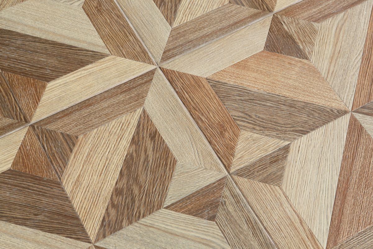 A floor with natural wood mosaic.