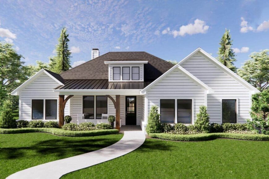 Front rendering with horizontal siding, multiple gables, and a shed dormer sitting above the covered entry porch.