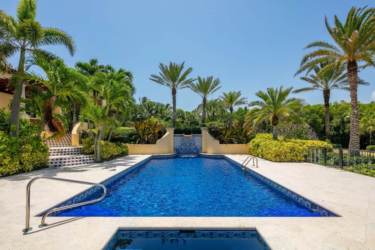 Limestone paving surrounds the swimming pool. Image courtesy of Toptenrealestatedeals.com.