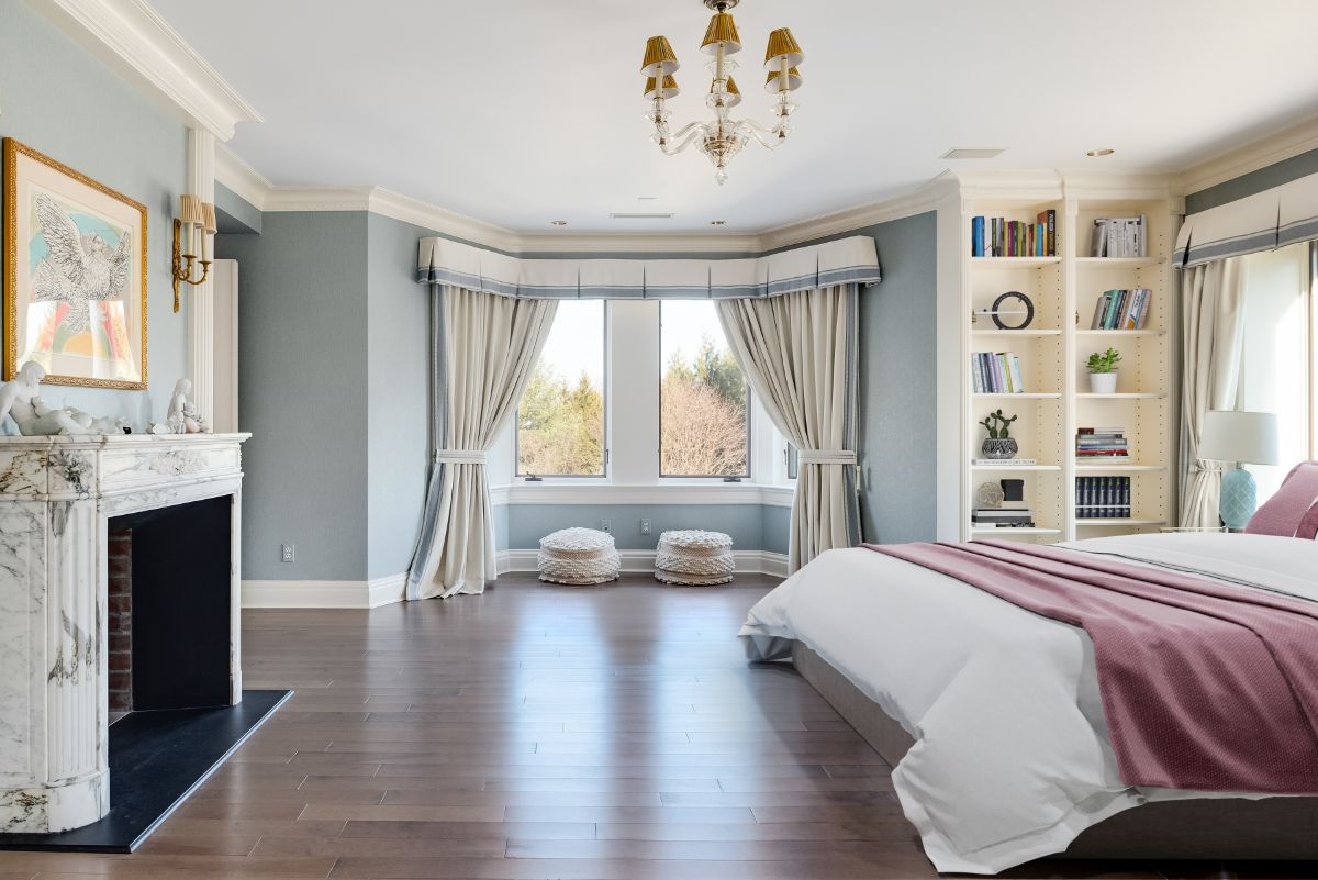 The master suite offers panoramic views of the gardens. Image courtesy of Toptenrealestatedeals.com