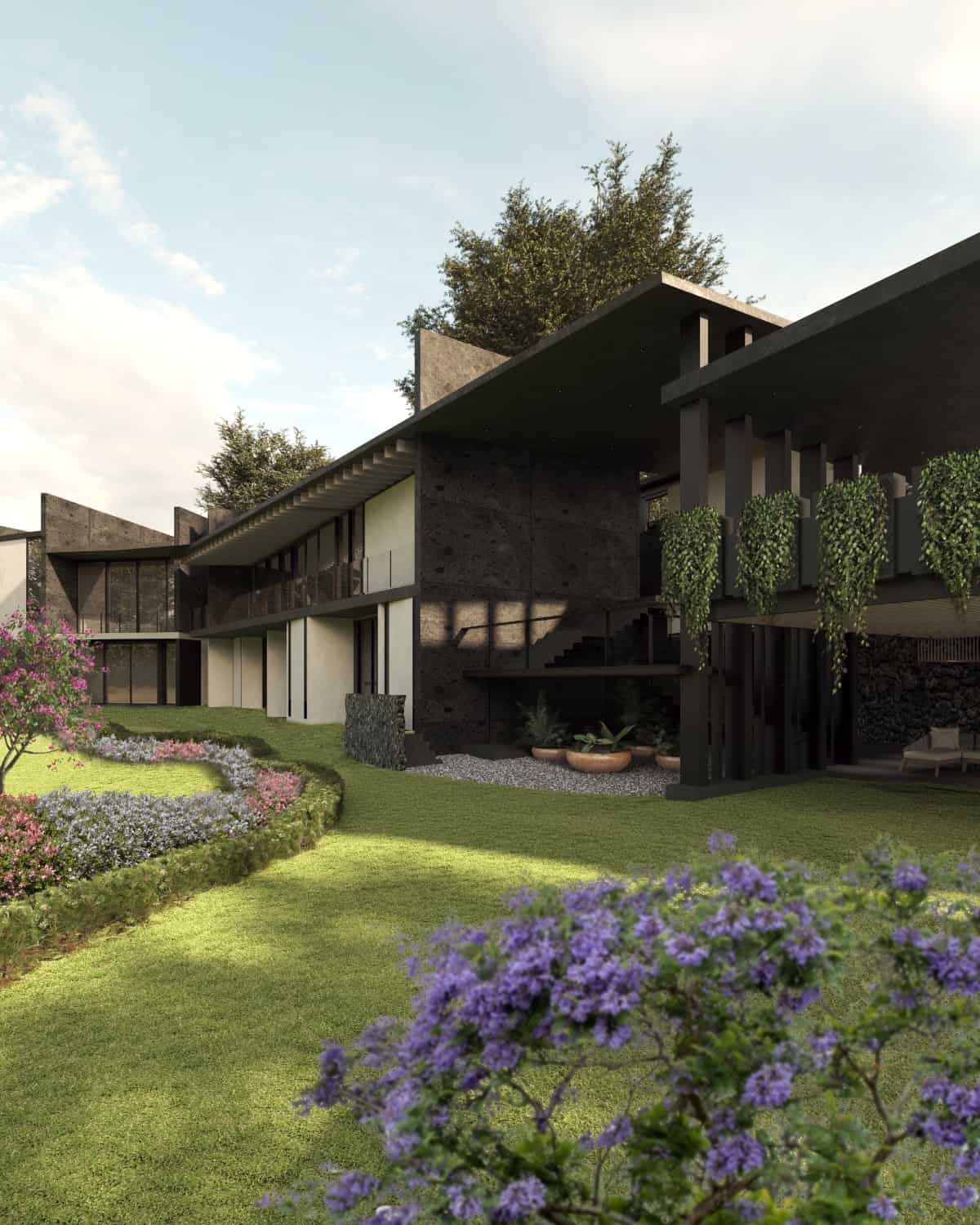 The home's exterior features concrete panels, structural beams, and stone accents.