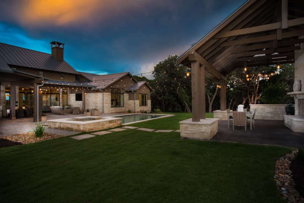 String lights stretching from the porch to the cabana set a romantic atmosphere during the night.