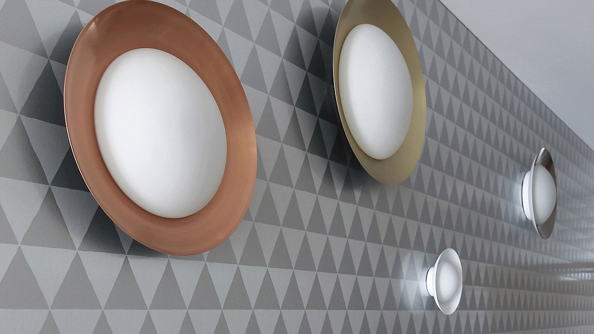 The corridor wallpapers have different shades of metal with plate designs.