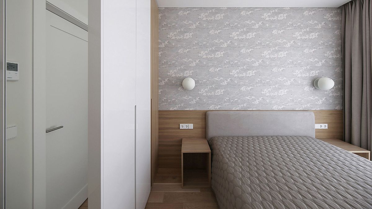 The interior layout of the bedroom is enlivened with wallpapers.