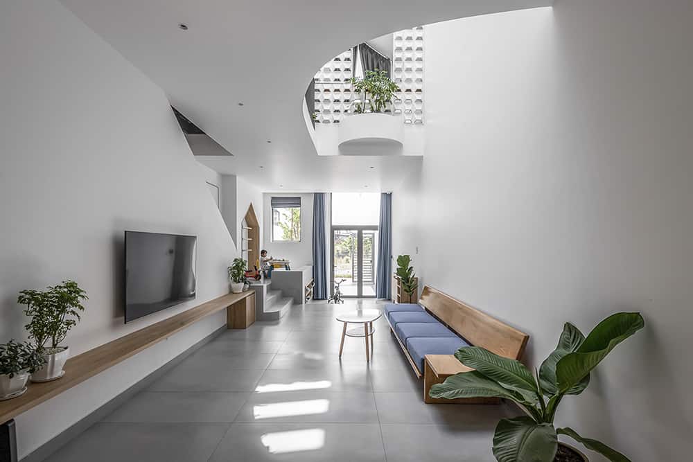 The living area's partially tall ceiling creates a spacious look while maintaining an intimate atmosphere.