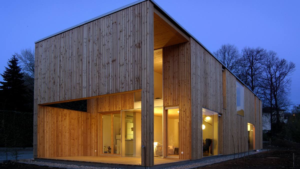 The Casa Duplo is lit up at sundown, showing a great view of the inside.