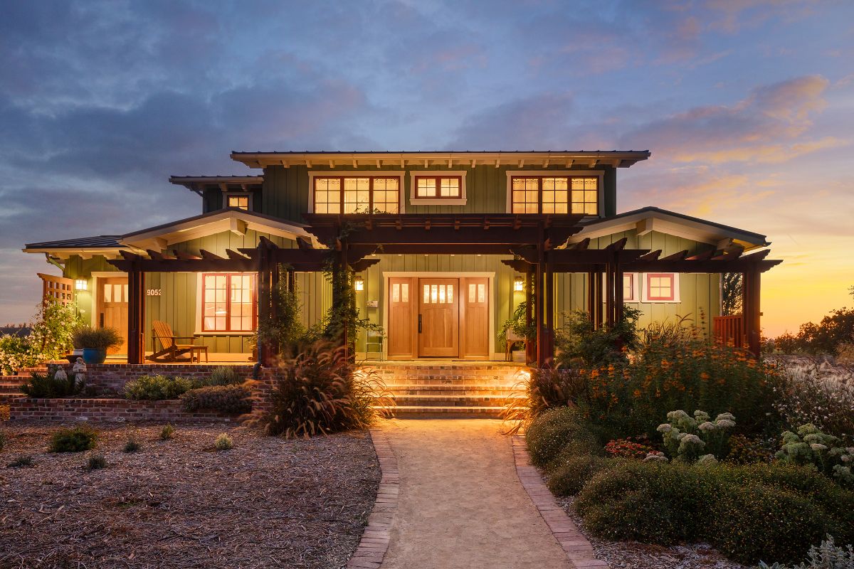 The house is lit with accent light during the night, giving the house a dramatic effect.