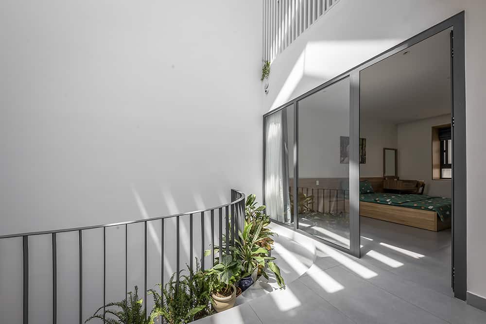 Oversized sliding glass doors encased the bedroom.