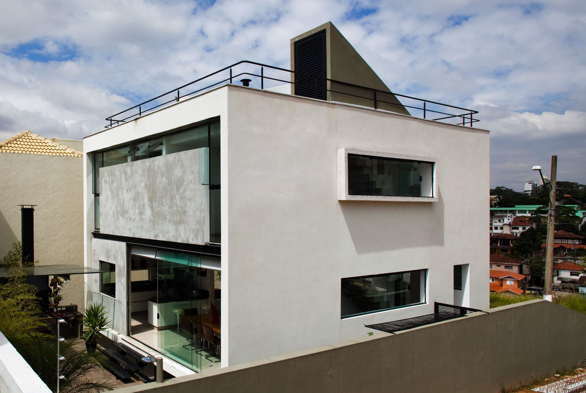 The house structure is made of reinforced concrete some parts were left exposed, giving the house its rough texture.