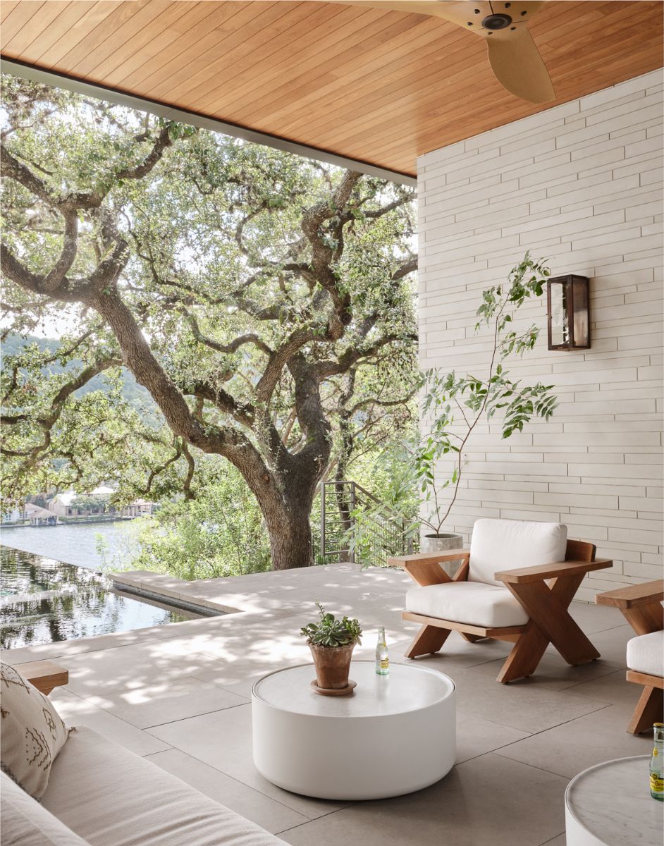 A large outdoor lounge flanks the pool.