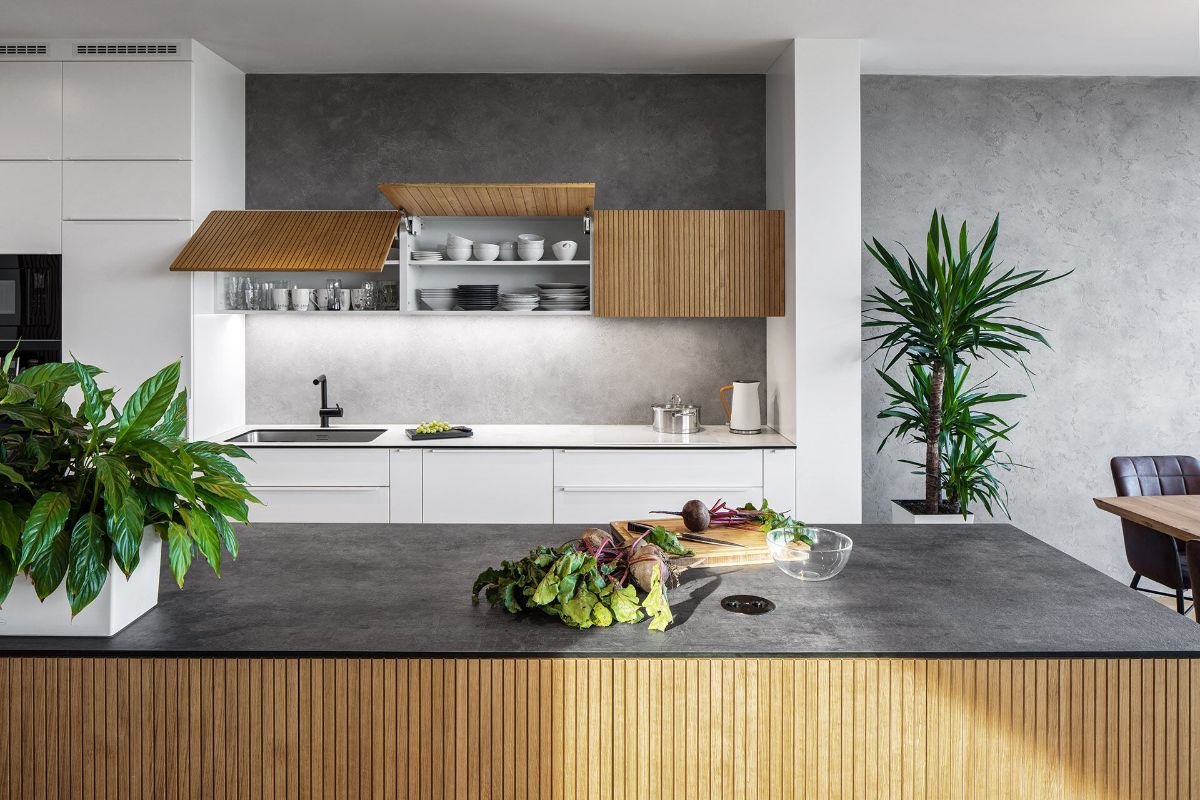 The kitchen line is intended to be an island. It is designed in a light way, so that it does not reach the ground.