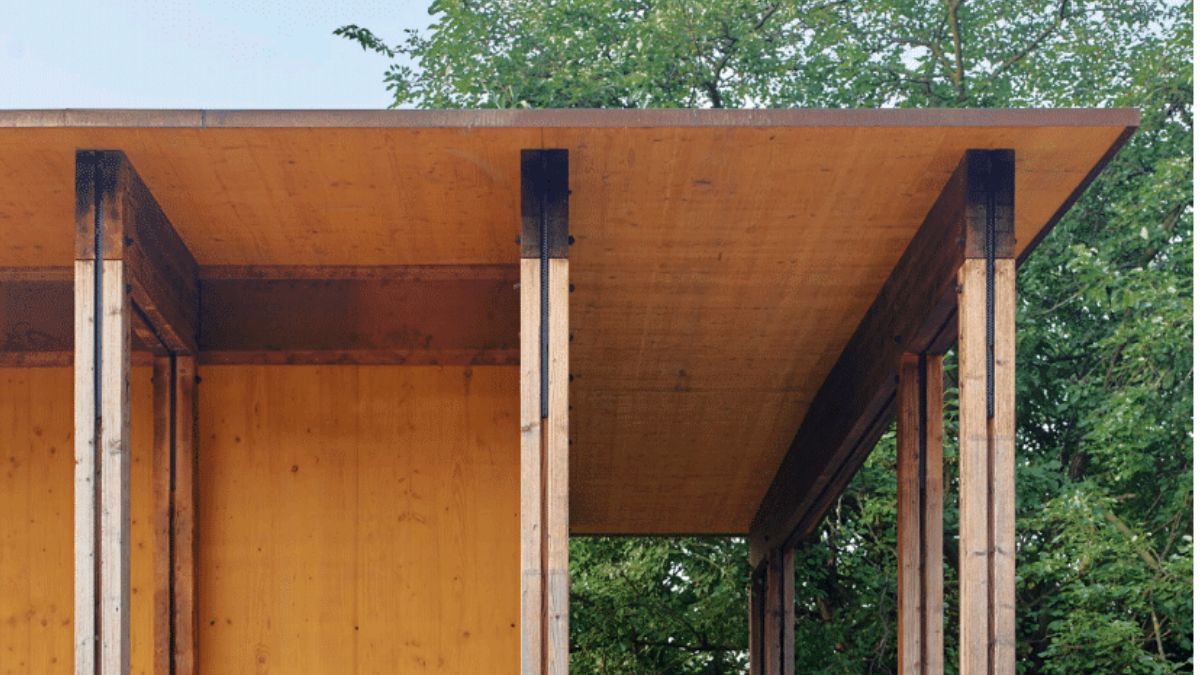 A roof reinforced with multiple wooden pillars to support it