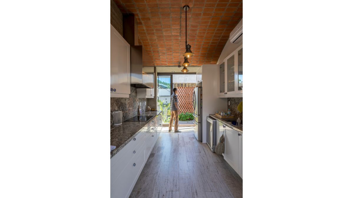 The Casa's kitchen is lengthy and provides direct access to the property's fresh ventilation outdoor space.