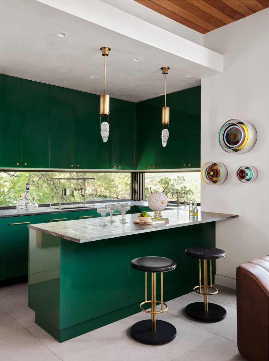 The modern dark green painted bar with a modern long window.