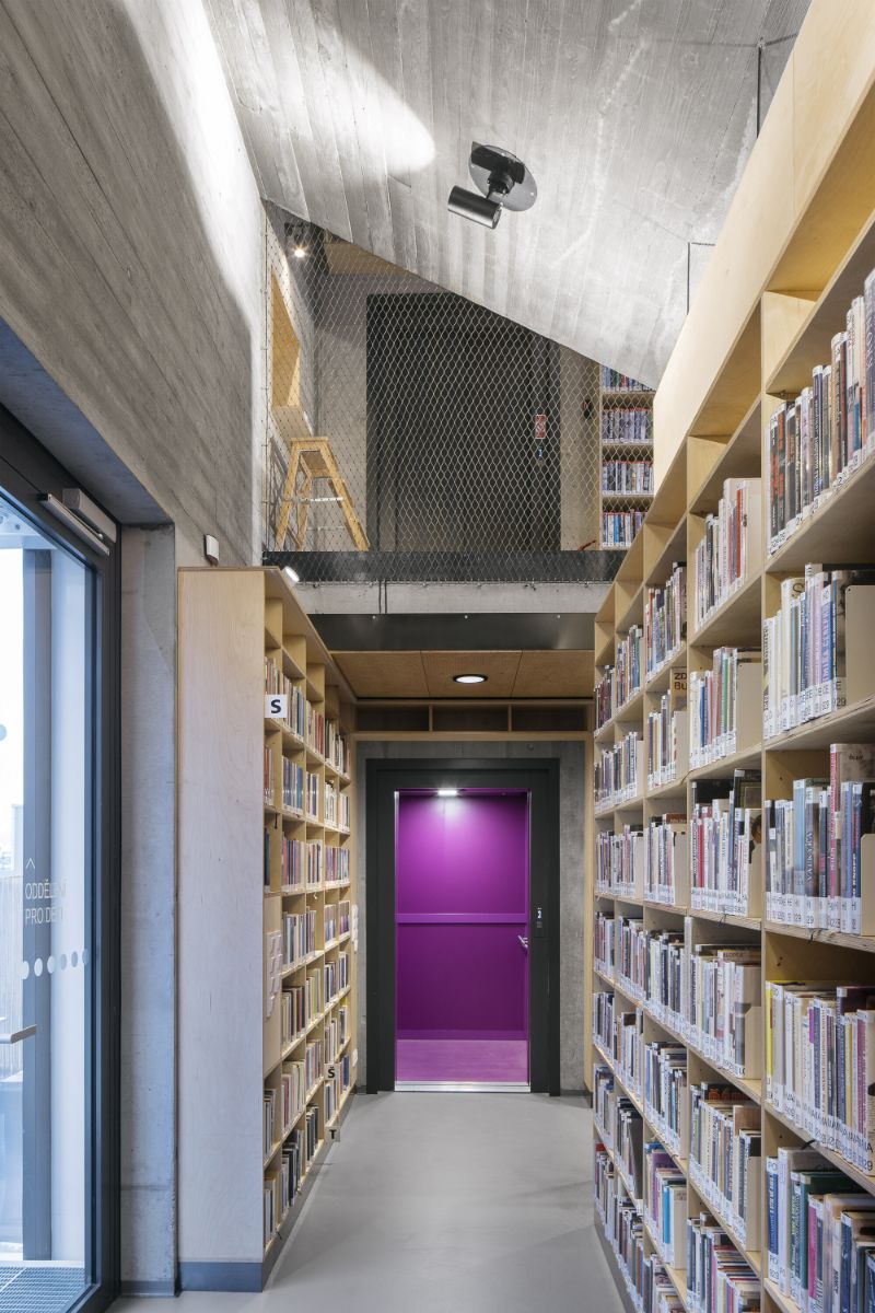 The library is integrated into the above-ground floors of the extension.