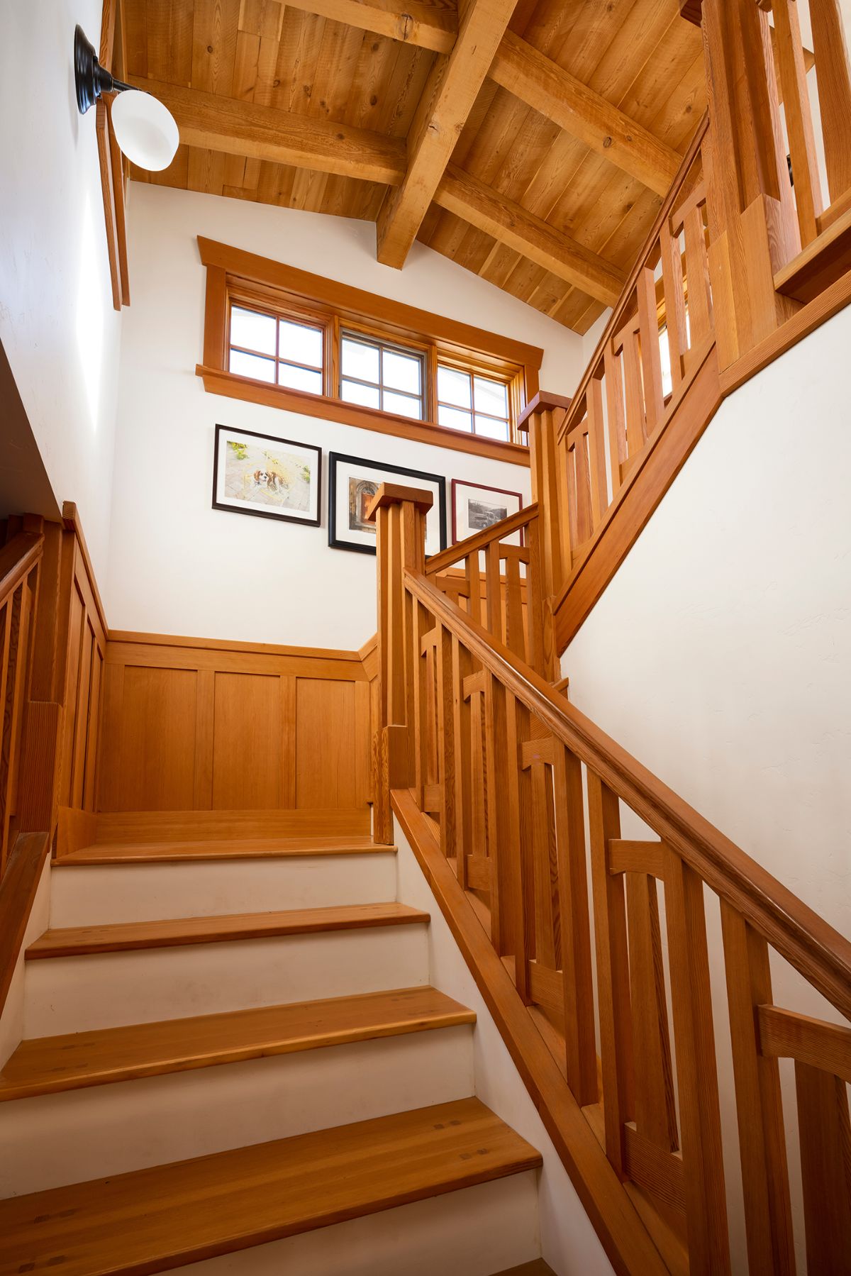 The stairs leading to the upper floors are made of solid wood with deep history.