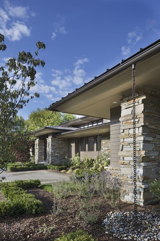 A closer look at the home showcasing its stone details.