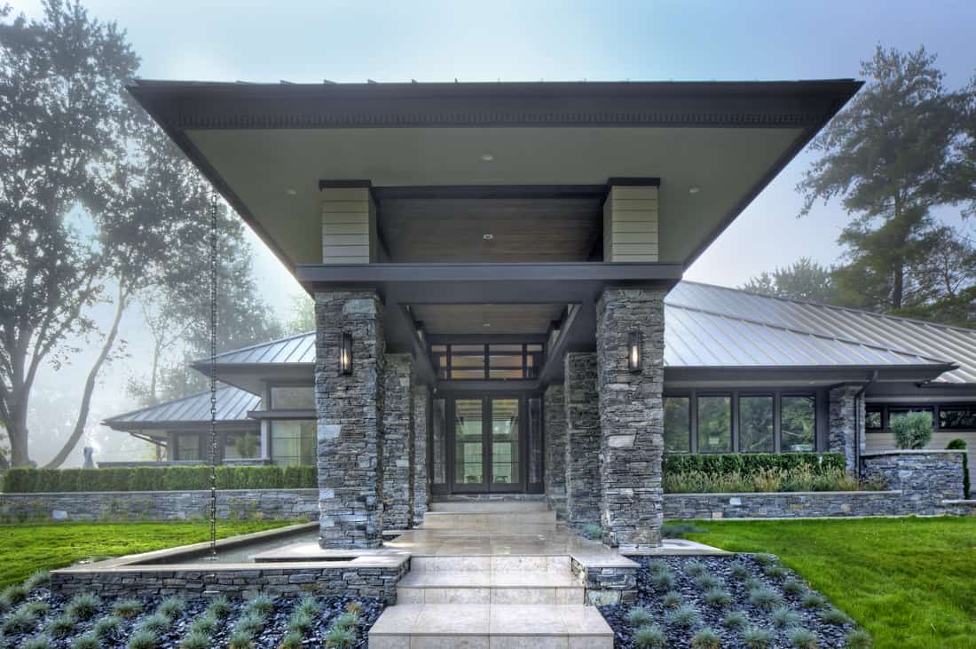 A closer look at the covered walkway adorned with a desert landscape.