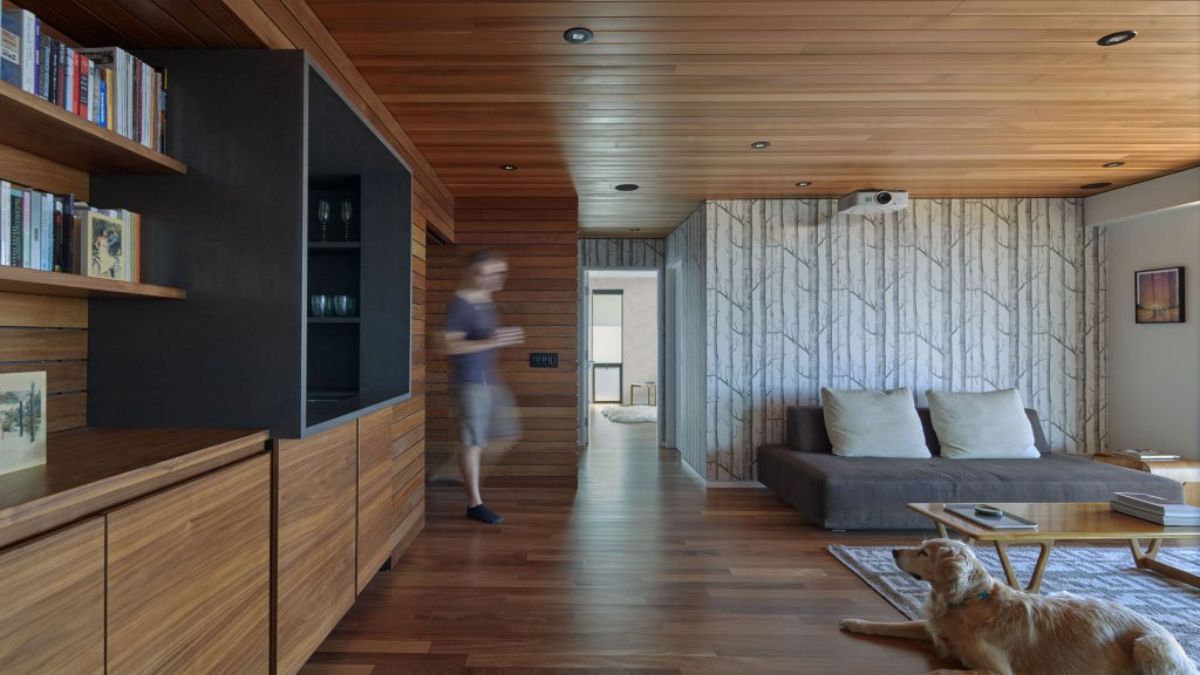 The photograph captures the interior of the media or projection room within the residence.