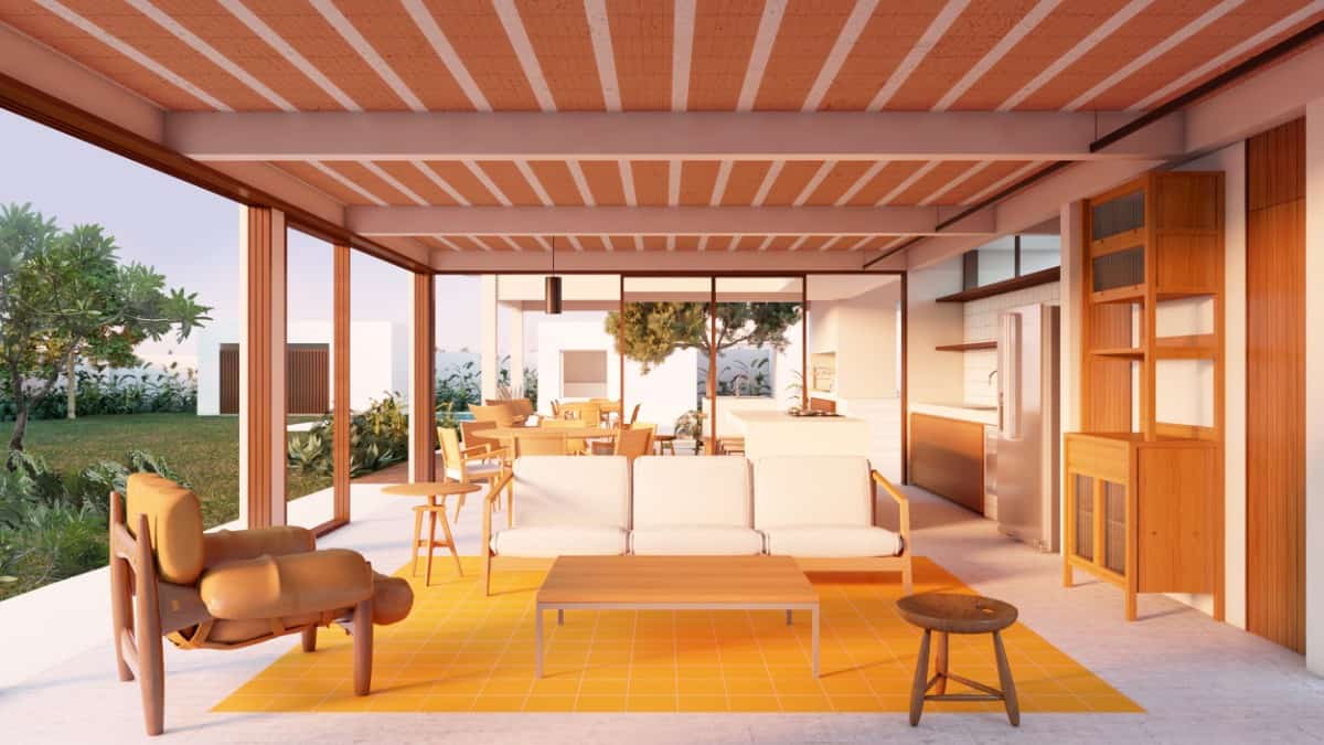 This living room features wooden furnishings, a beamed ceiling, and a vibrant area rug.