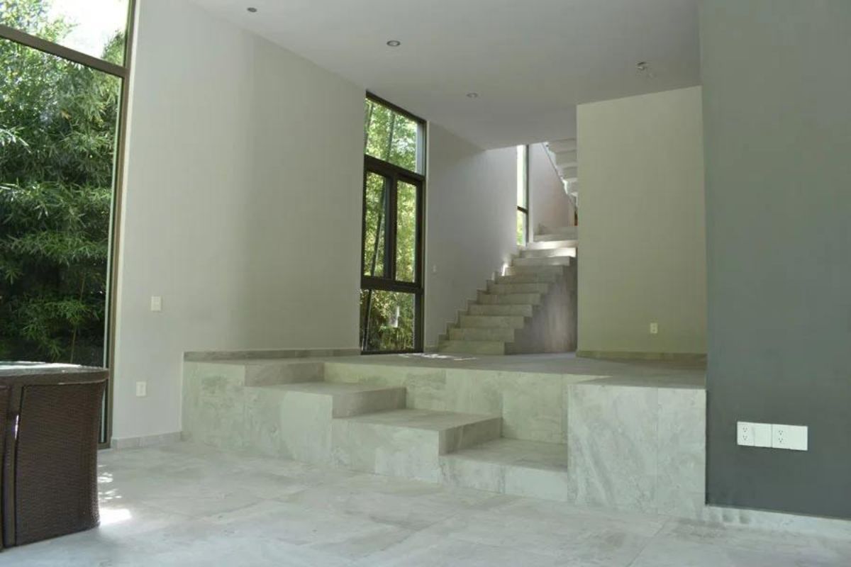 This image highlights the distinctive elevation design of the staircase.