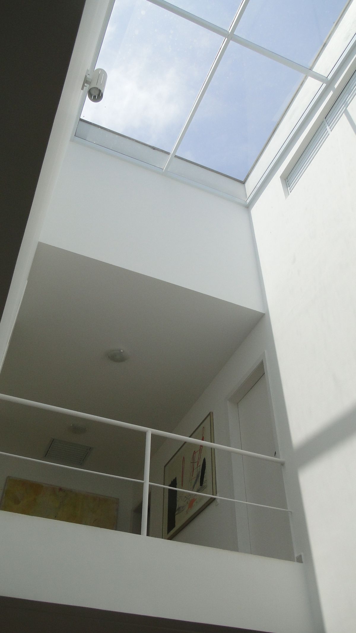 The house features a large skylight letting the light in during the day.