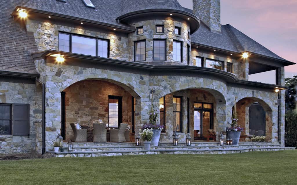 One last look at the home's exterior complemented by the warm glow from the outdoor lamps.