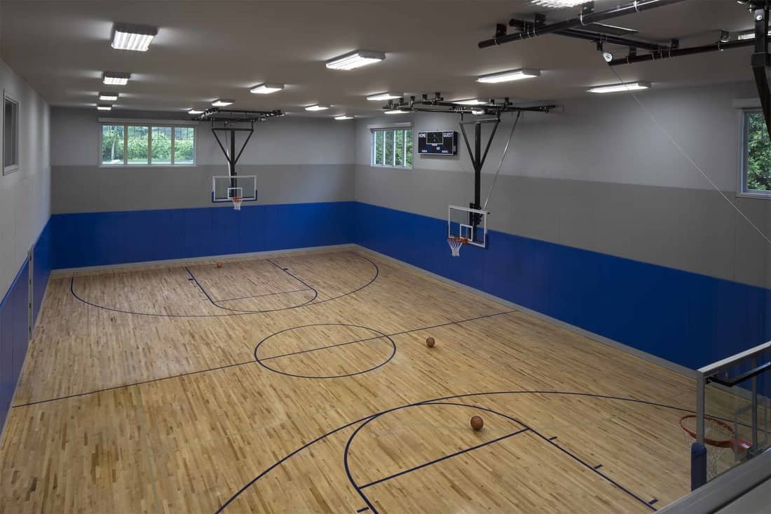 The home also features a full sports court with three basketball rings.