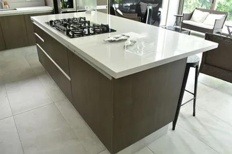 This photograph showcases the design of the kitchen island table.