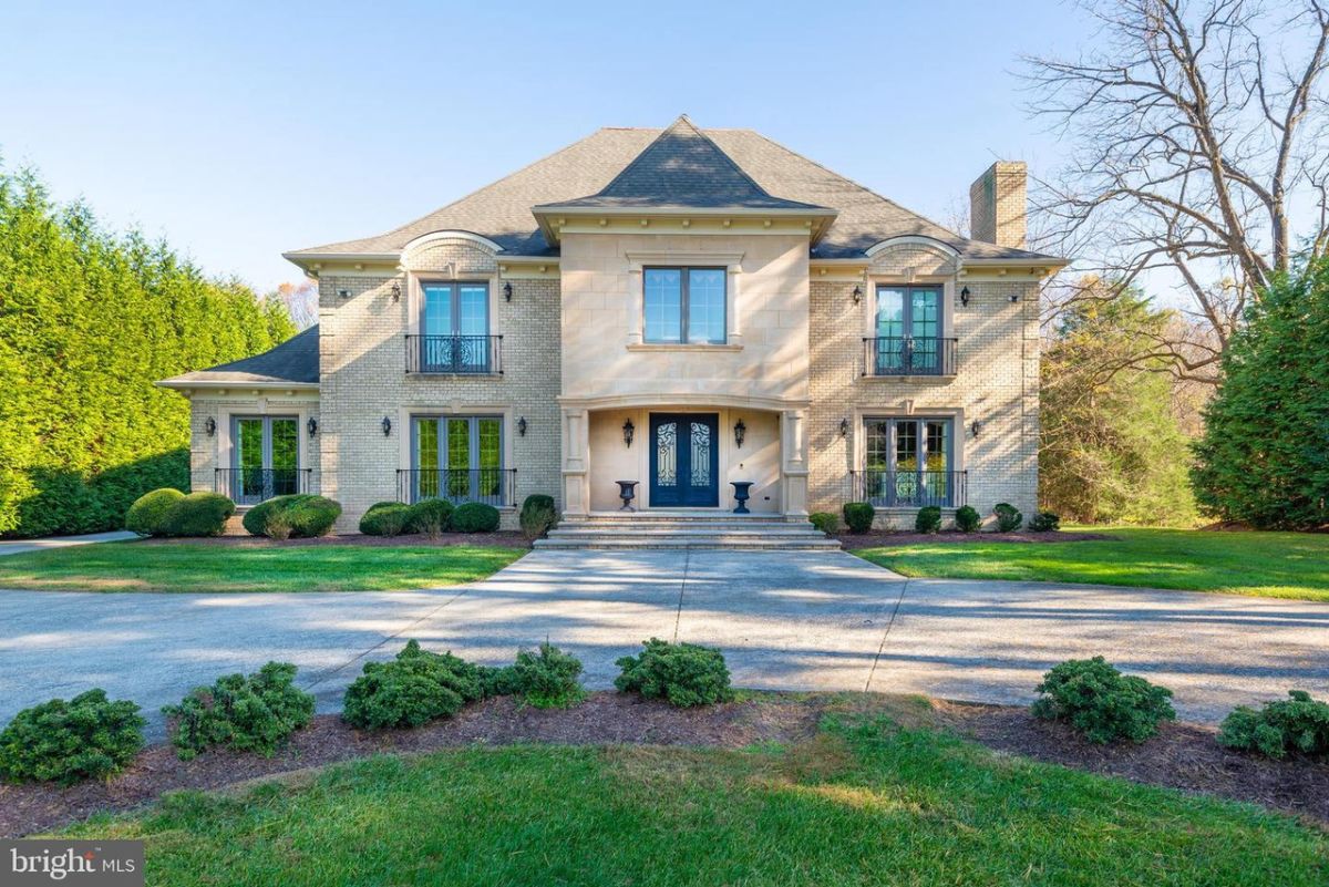 The exterior of the house is made from bricks and concrete, giving the house a classic luxurious look.