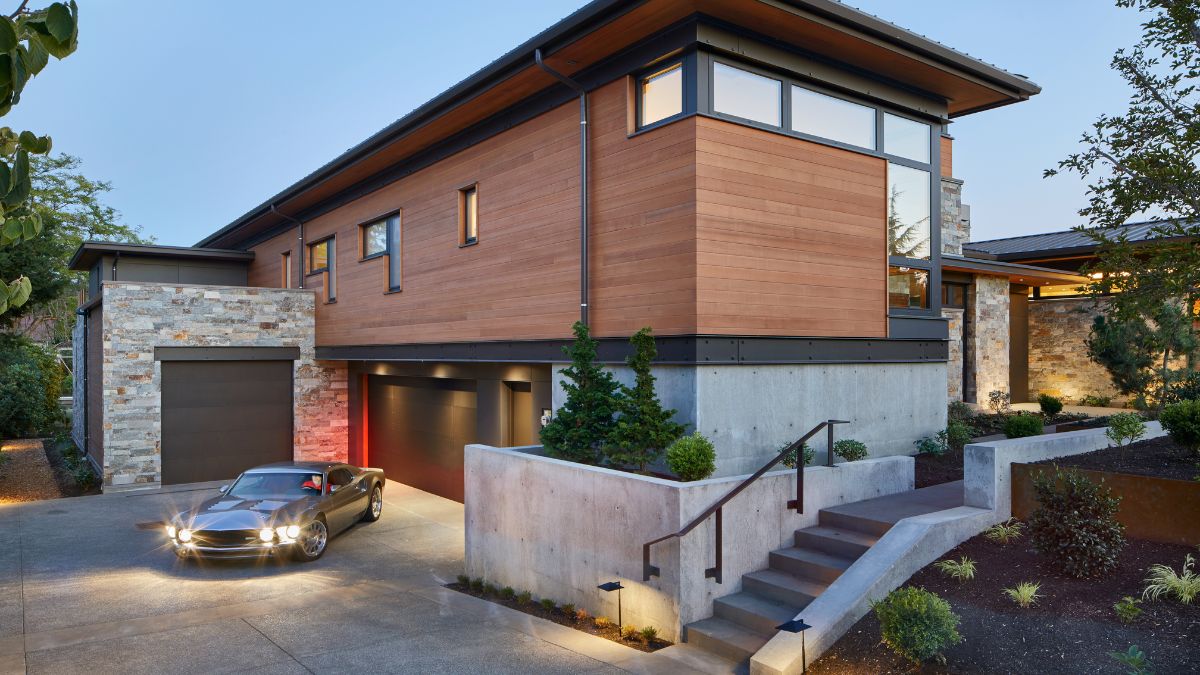 The spacious driveway and garage with car space.