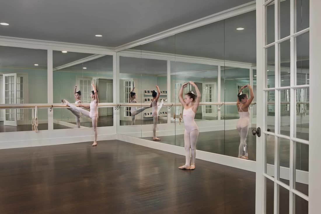 The home includes a dance studio surrounded by mirrors.