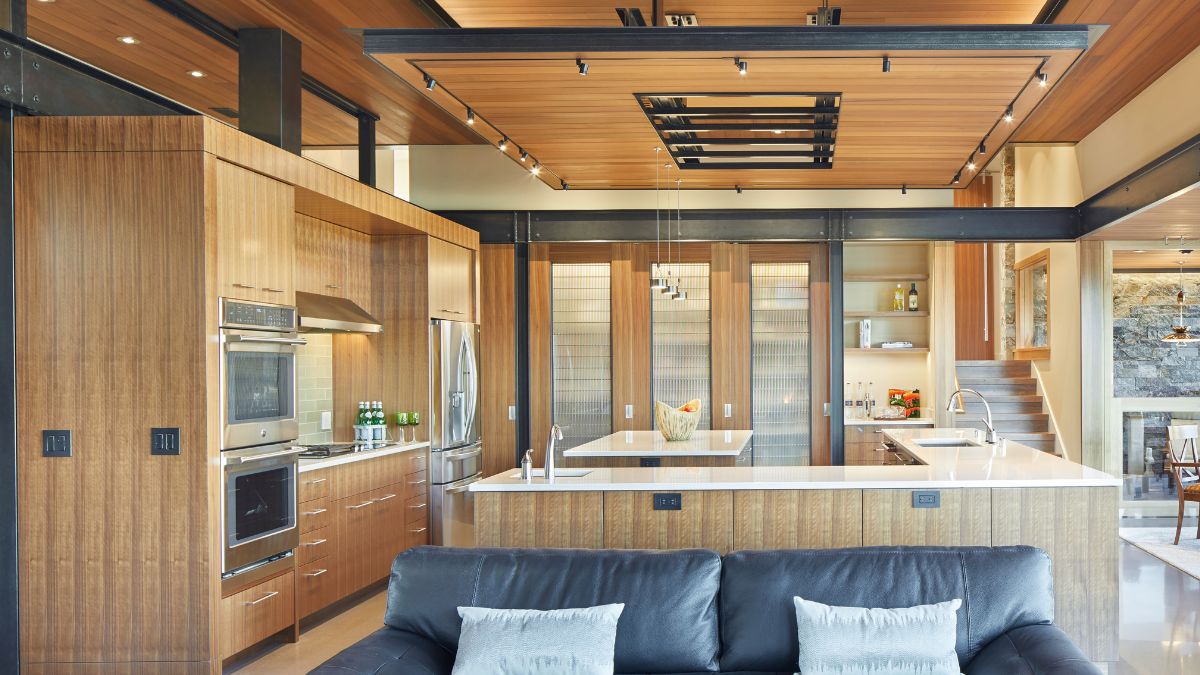 The kitchen space is entirely made of wood, from the ceiling to the cabinets, and it has fantastic lighting that makes you feel enthusiastic.