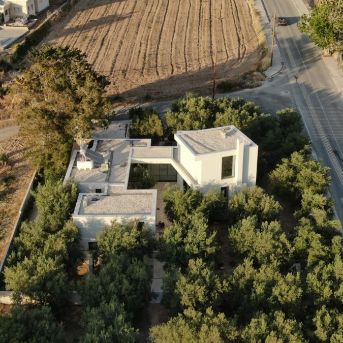 This is an alternative aerial view showcasing the house's surrounding, captured from a distinct vantage point.