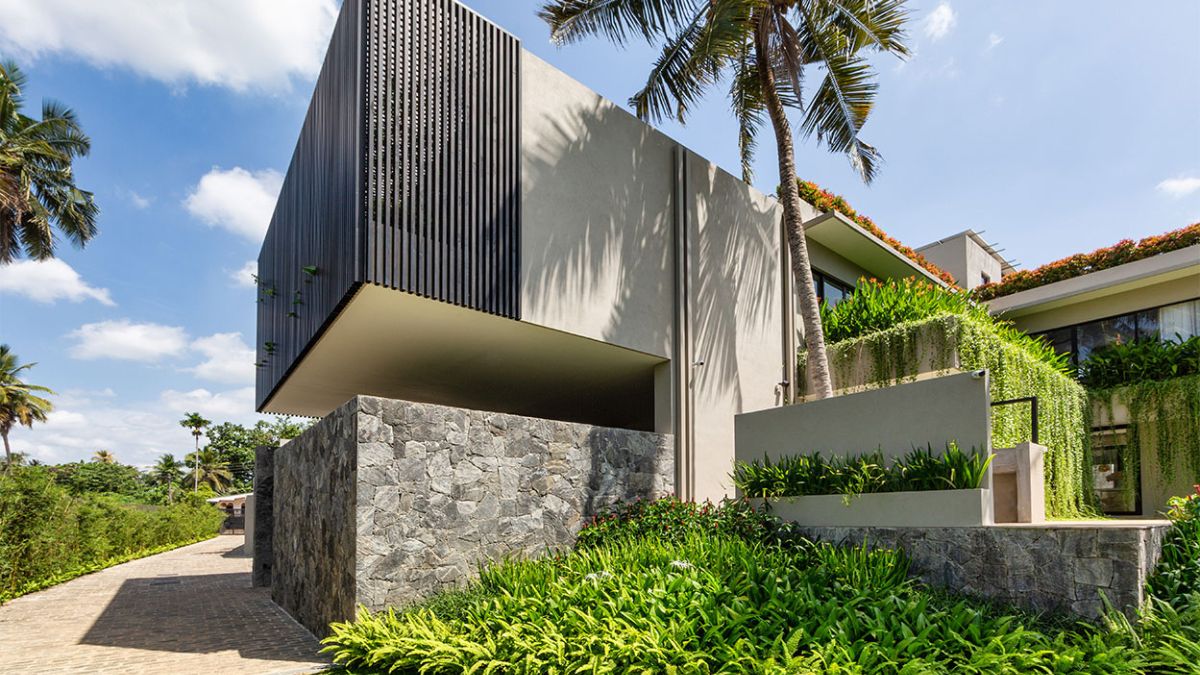 This perspective shot captures the exterior design of the house, providing a stunning view of its architectural beauty and elegant style.