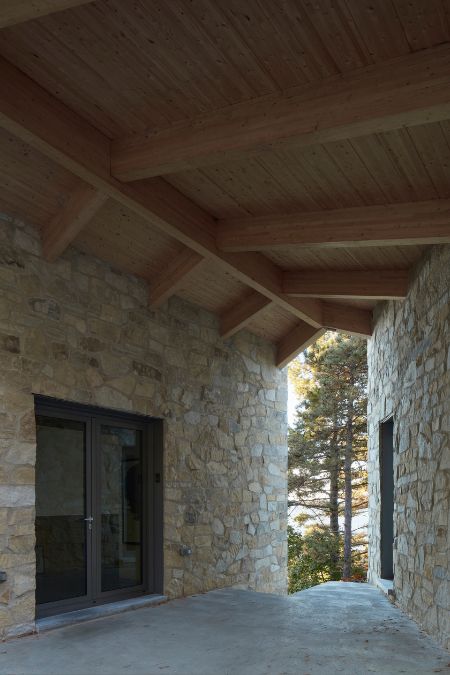 A stone dwelling showcasing the primary entrance door.