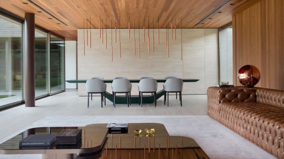 The reflection of the decorations on the suspended ceiling above the dining area.